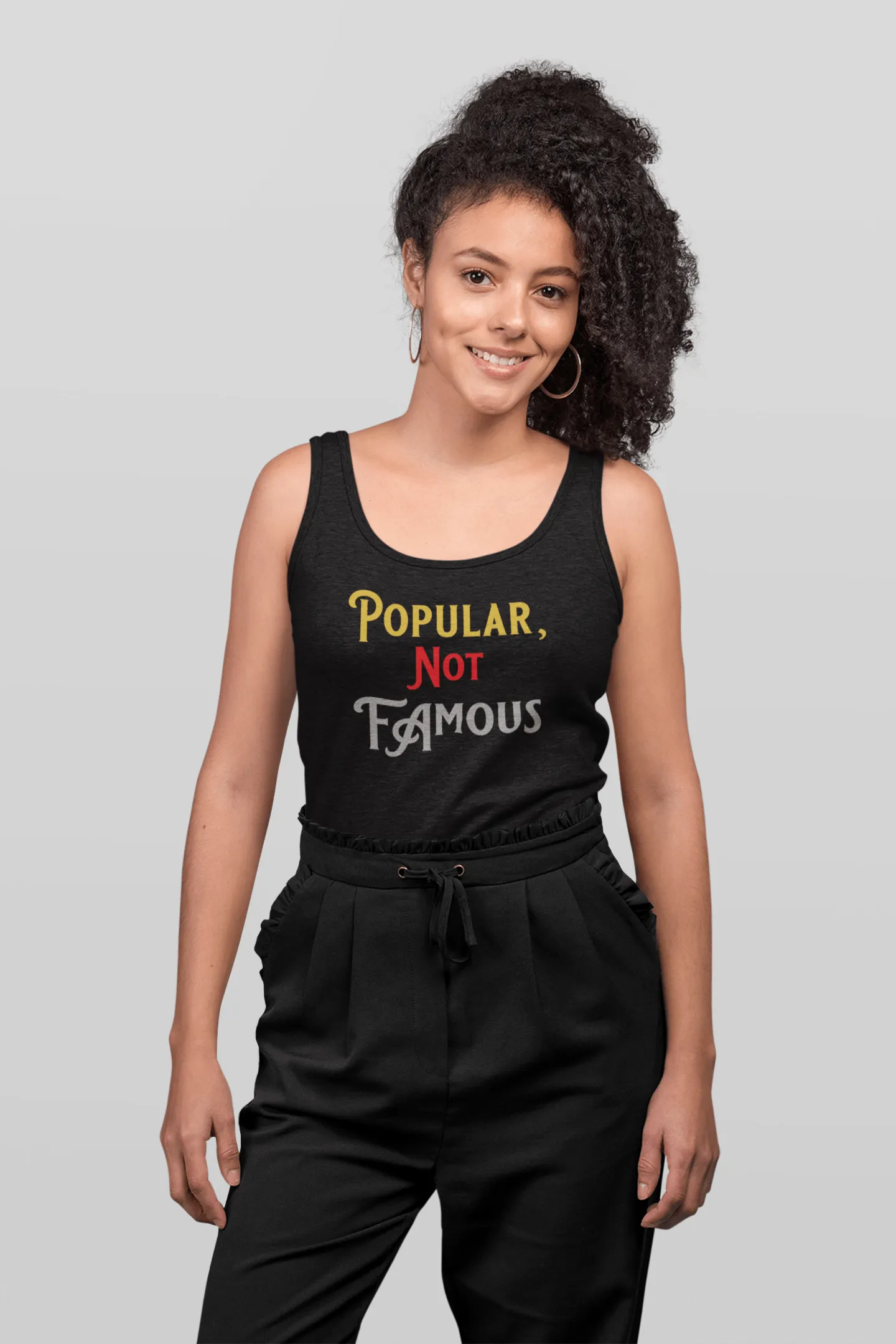 100% Ringspun Cotton Tank Top w/ “Popular Not Famous" Graphic Design